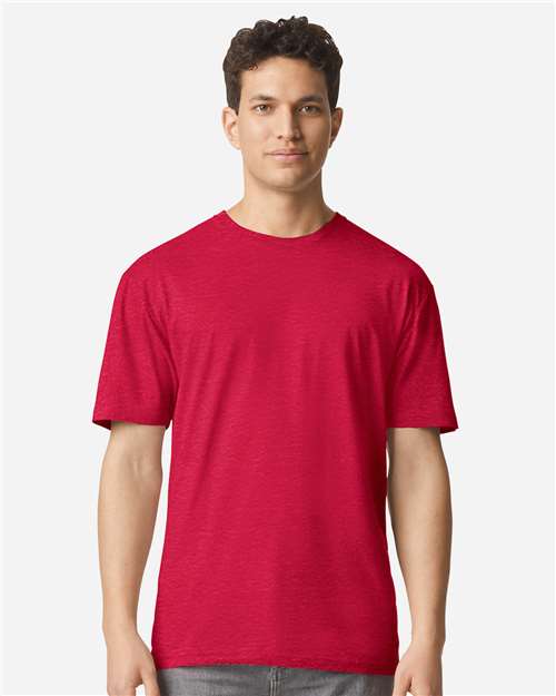 Model wearing a Gildan 3000 Unisex Light Cotton T-Shirt in a neutral color, showcasing its casual design.