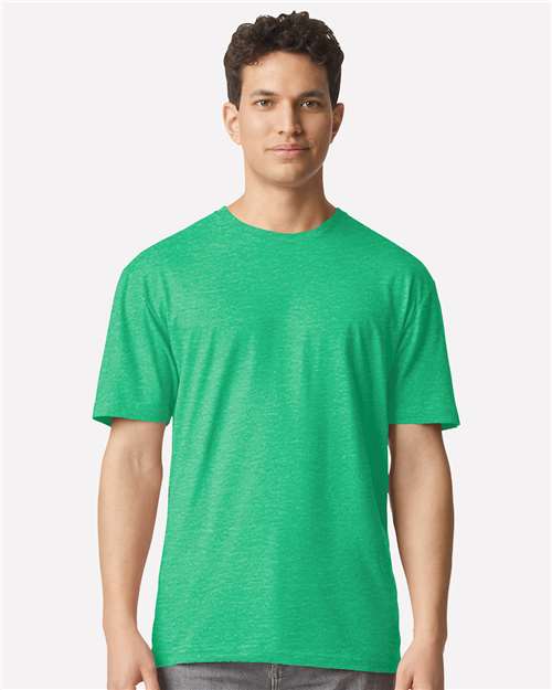 Model wearing a Gildan 3000 Unisex Light Cotton T-Shirt in a neutral color, showcasing its casual design.