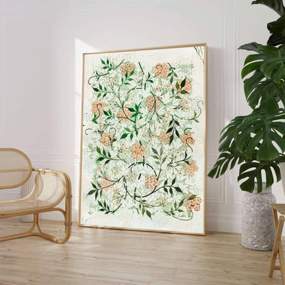 William Morris Jasmine Green Floral Wall Poster displayed on a stylish table with decorative items and soft natural light.