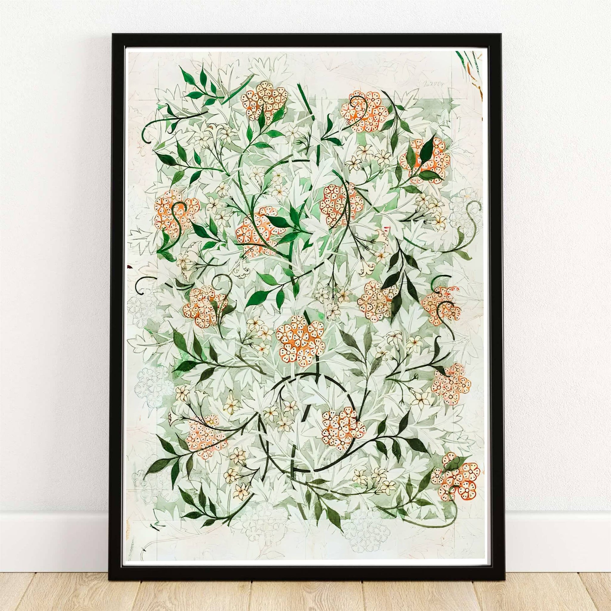 William Morris Jasmine Green Floral Wall Poster displayed on a stylish table with decorative items and soft natural light.